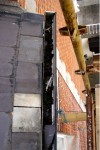 Dirt blocking broken gutters in need of cleaning & repairing